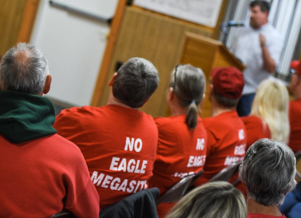 Eagle Township residents filled the Eagle Township Hall, Thursday, May, 18, 2023, where a majority of the meeting was spent with residents speaking out against the proposed megasite, calling out for more transparency and better communication from township officials.