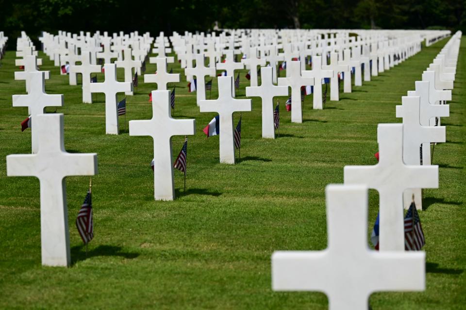 White crosses mark some of the 9,388 graves at the Normandy American Cemetery of Colleville-sur-Mer, near Omaha Beach in northwestern France