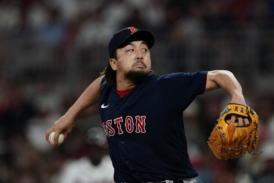 Boston Red Sox relief pitcher Hirokazu Sawamura works in the seventh inning of the team's baseball game against the Atlanta Braves on Tuesday, June 15, 2021, in Atlanta. (AP Photo/John Bazemore)
