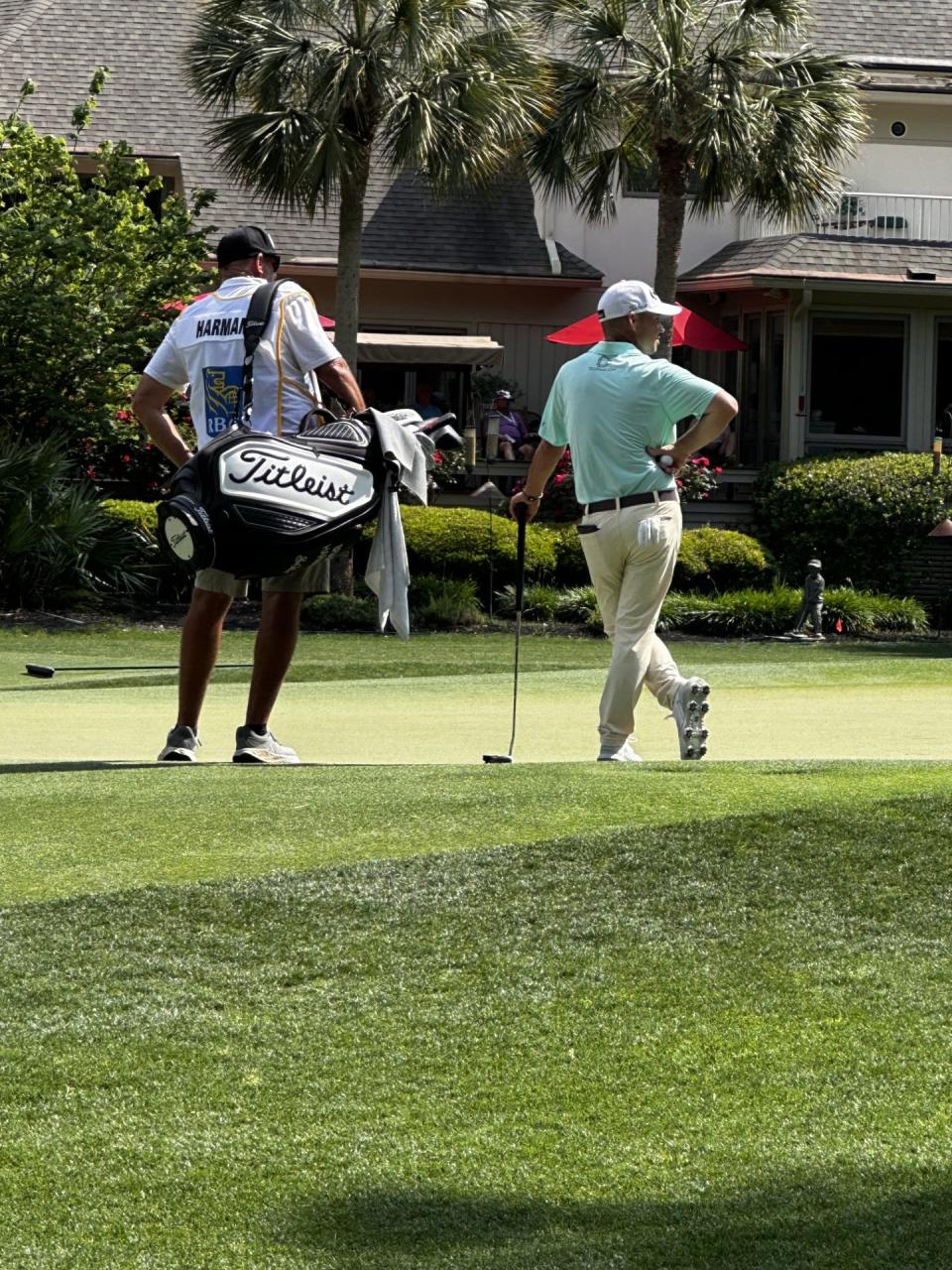 Brian Harman and caddie Scott Tway on the 12th green at Harbour Town Golf Links at the RBC Heritage Tournament on April 18, 2024.