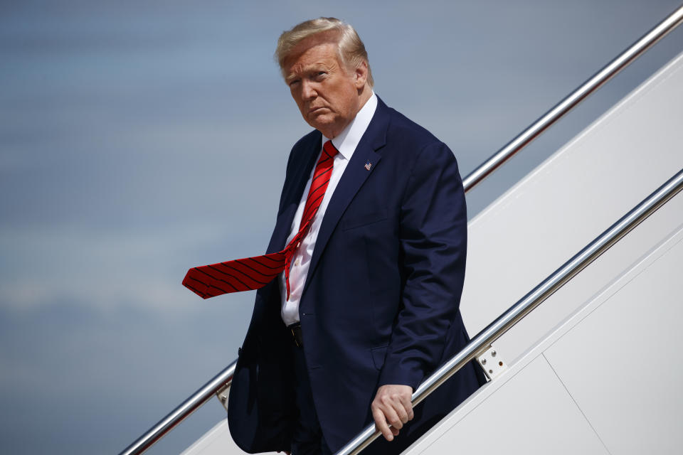 President Donald Trump steps off Air Force One after arriving at Andrews Air Force Base, Thursday, Sept. 26, 2019, in Andrews Air Force Base, Md. (AP Photo/Evan Vucci)