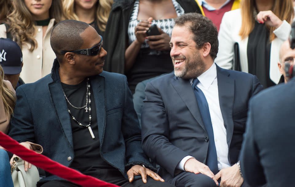 The Hollywood bigshot is seen here with Eddie Murphy. It was the unveiling of Ratner's Hollywood star. Source: Getty