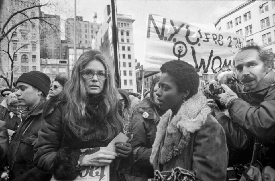 original caption rep bella abzug, d ny, feminist gloria steinem and lt gov maryann krupsak of new york l r chat with the marchers and newsmen in midtown manhattan prior to the start of the international womens day march some 2,000 women from all walks of life joined the solidarity march in which they demanded full economic political, legal, sexual and racial equality and the right to control their own lives and bodies photo by bettmann archivegetty images