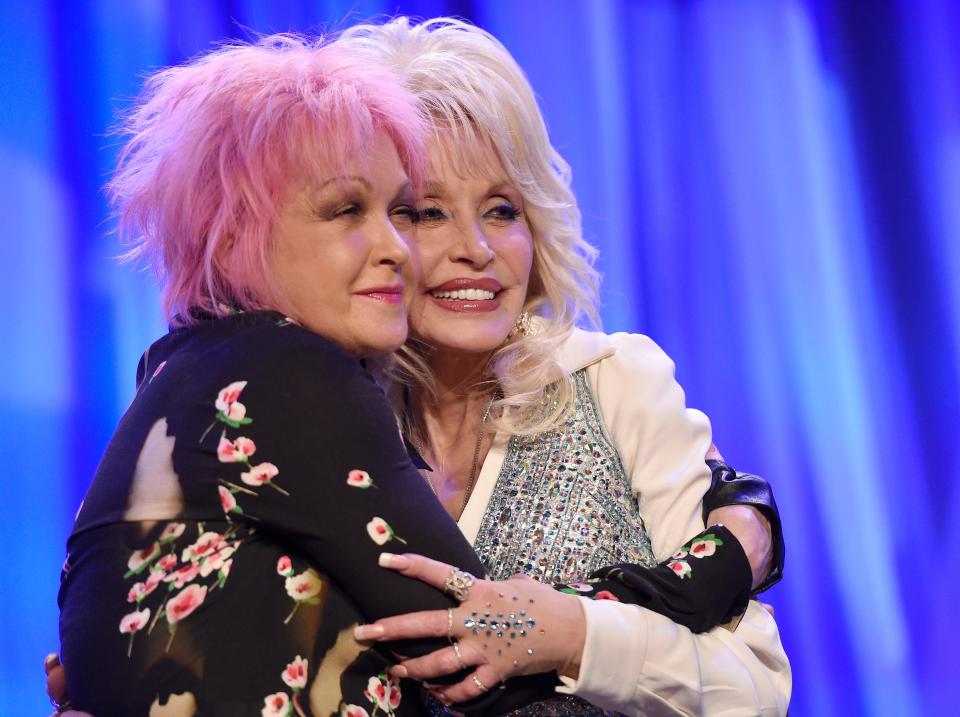 Dolly Parton, Belinda Carlisle, Cyndi Lauper, Gloria Estefan, and Debbie Harry have come together to throw the ultimate Hail Mary: A song.