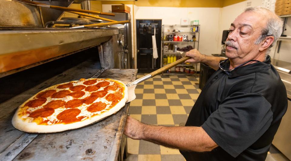 What makes the perfect pizza? Mike Terriaca, the owner of Formaggio Pizza & Italian Restaurant, said, "It's the dough, cheese and the person making it." The restaurant is located at 1053 NE 14th St.