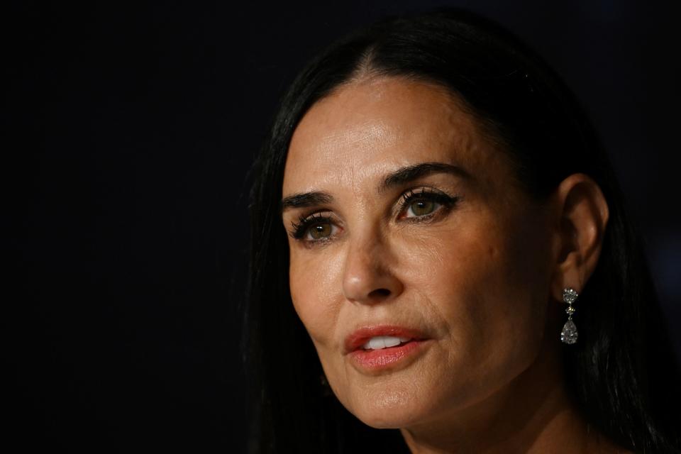 The Demi Moore-starred body horror film "The Substance" premiered at Cannes to an extended standing ovation.