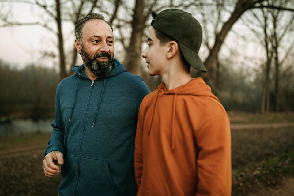 Experts suggest kick-starting the discussion while out on a walk. (Getty Images)