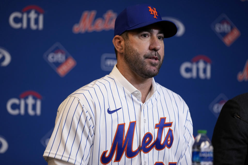 FILE - New York Mets pitcher Justin Verlander attends a news conference at Citi Field, Dec. 20, 2022, in New York. After the Atlanta Braves rallied for the division title and the Mets were eliminated in the first round of the playoffs, Mets owner Steve Cohen went on an epic spending spree that included the additions of pitchers Verlander and Kodai Senga. (AP Photo/Seth Wenig)