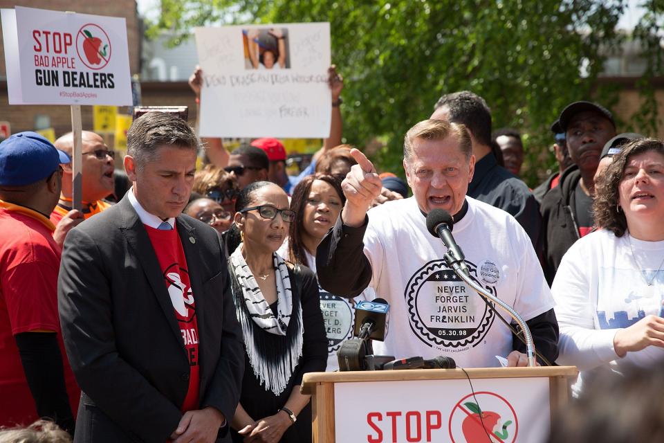Dan Gross, President of the Brady Campaign to Prevent Gun Violence (L) and Father Michael Pfleger attend the Stop Bad Apple Gun Dealers Protest at Chuck's Gun Shop on June 6, 2015 in Riverdale, Illinois. 
