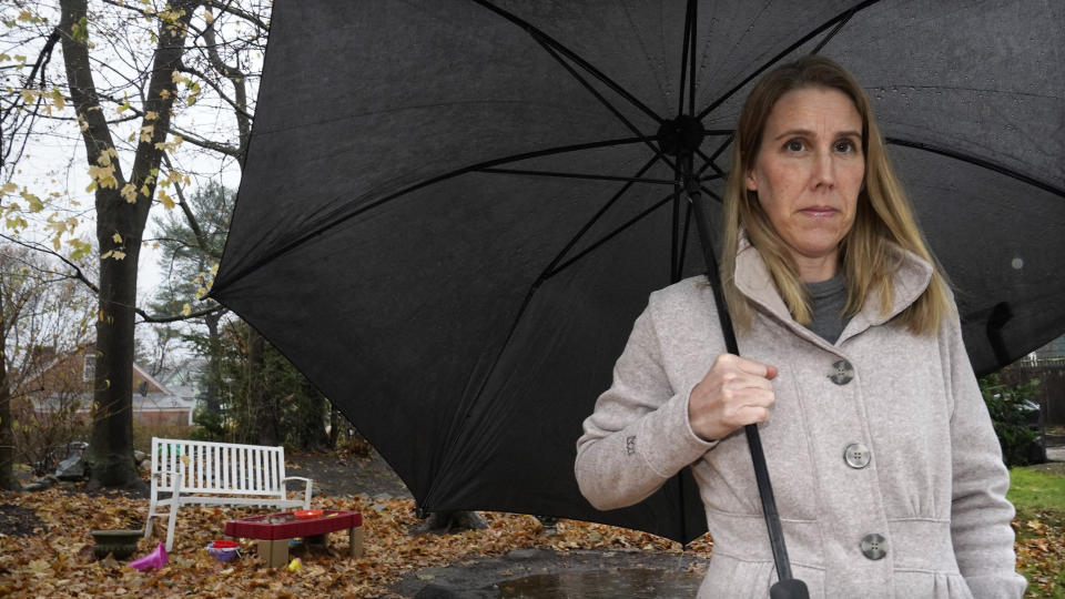 Claire Tillberg, stands for a portrait outside her family's home, Monday, Nov. 23, 2020, in a Boston suburb. The coronavirus pandemic has led to rising emergency room visits and longer waits for U.S. children and teens facing mental health issues. Tillberg's 11-year-old daughter with mental health issues waited a week in an emergency room before being transferred to a different hospital. (AP Photo/Charles Krupa)