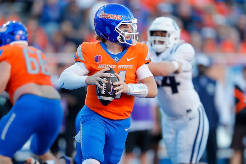 Boise State quarterback Maddux Madsen (4) looks down field against Utah State in the first half of an NCAA college football game, Saturday, Oct. 5, 2024, in Boise, Idaho. . (AP Photo/Steve Conner) | Steve Conner