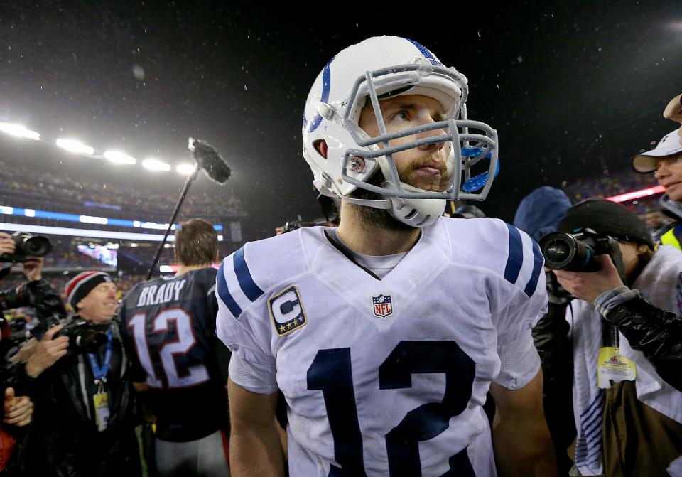 Indianapolis Colts quarterback Andrew Luck walks away from New England Patriots quarterback Tom Brady after the game. The Indianapolis Colts play the New England Patriots in the AFC Championship game Sunday, January 18, 2015, at Gillette Stadium in Foxborough MA.