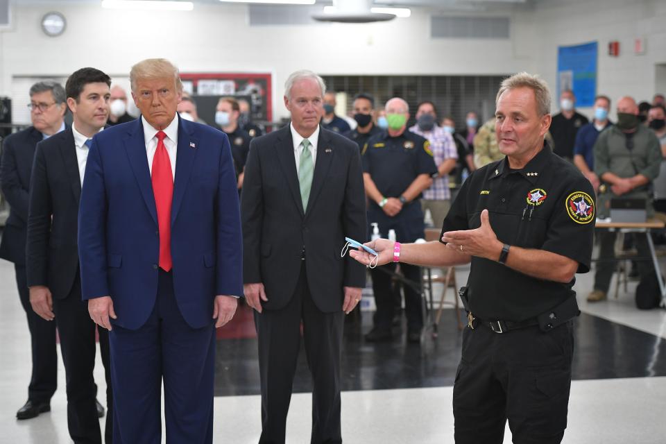 Kenosha County Sheriff David Beth in Wisconsin welcomes President Donald Trump on on Sept. 1, 2020.