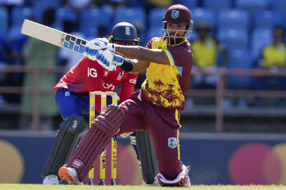 West Indies' Nicholas Pooran plays a shot against England during the third T20 cricket match at National Cricket Stadium in Saint George's, Grenada, Saturday, Dec. 16, 2023. (AP Photo/Ricardo Mazalan)