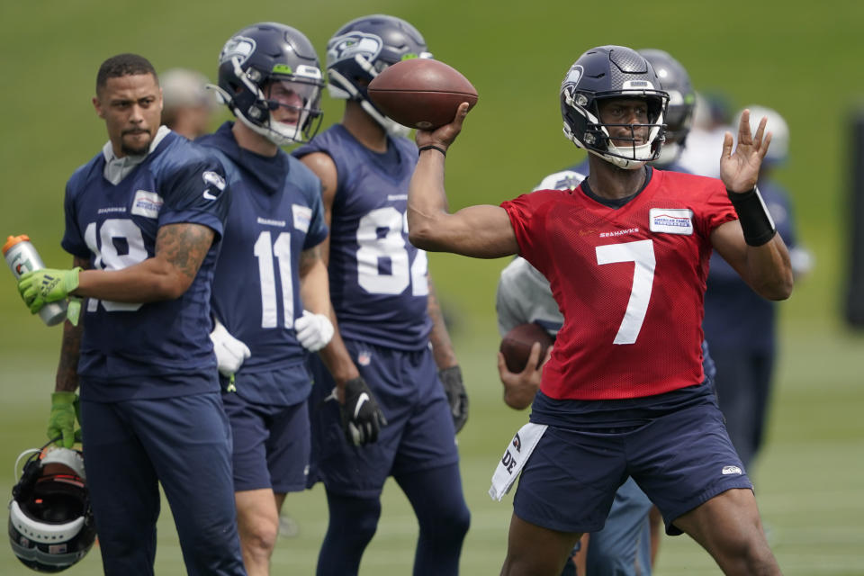 Seattle Seahawks quarterback Geno Smith (7) throws a pass during NFL football practice Wednesday, June 8, 2022, in Renton, Wash. (AP Photo/Ted S. Warren)