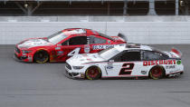 Kevin Harvick (4) competes with Brad Keselowski (2) during a NASCAR Cup Series auto race at Michigan International Speedway in Brooklyn, Mich., Saturday, Aug. 8, 2020. (AP Photo/Paul Sancya)