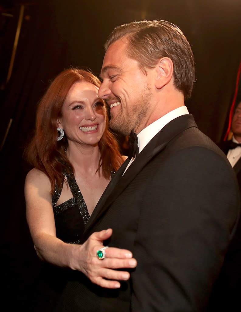 Julianne Moore and Leonardo DiCaprio attend the 88th Annual Academy Awards at Dolby Theatre on February 28, 2016 in Hollywood, California.  