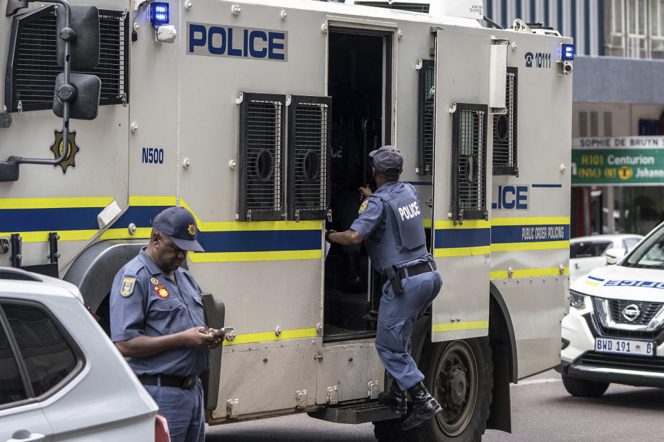 Police are seen at the Department of Correctional Services Headquarters in Pretoria, South Africa, Friday, Jan. 5, 2024 where South African athlete Oscar Pistorius was expected to be released. Pistorius has served nearly nine years of his 13 years and five months murder sentence for killing girlfriend Reeva Steenkamp on Valentine’s Day 2013. (AP Photo/Shiraaz Mohamed)