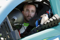 FILE - In this Feb. 9, 2020, file photo, Ross Chastain prepares to exit his car during NASCAR auto race qualifying at Daytona International Speedway in Daytona Beach, Fla. Former NASCAR champion Matt Kenseth will once again come out of retirement to compete for Chip Ganassi Racing as the replacement for fired driver Kyle Larson. Chastain was assumed the leading contender to replace Larson but the team instead announced Monday, April 27, 2020, it will go with two-time Daytona 500 winner Kenseth for the remainder of the season. (AP Photo/John Raoux, File)