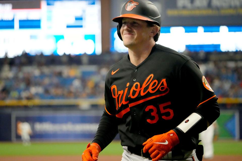 Rutschman reacts after hitting a home run at Tropicana Field.