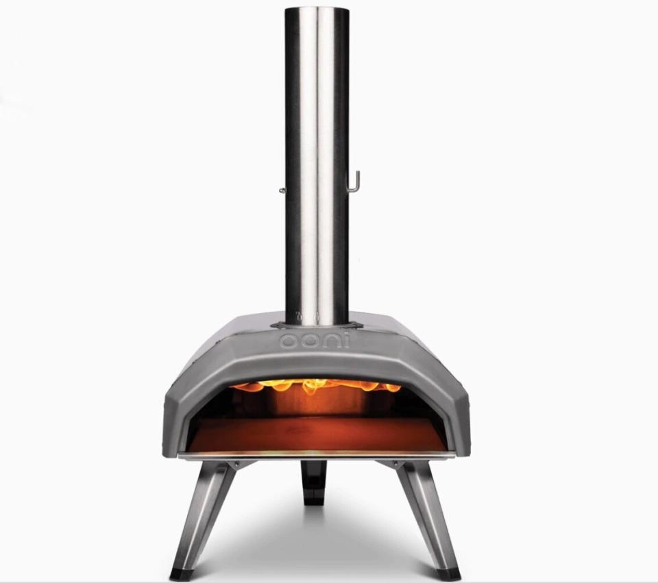 An outdoor pizza oven had always seemed like an obnoxious luxury -- until the pandemic, when the idea of casually stopping into a pizzeria for a slice became an impossible dream. Ooni makes a few versions that are on the more affordable side (they start at $249) and you can choose between options powered by gas, wood, or a combination of wood, charcoal or gas. The best part? It reaches upwards of 900 degrees F in 15 minutes and can cook your pizza in under 60 seconds.<br /><br /><strong><a href="https://ooni.com/products/ooni-karu" target="_blank" rel="noopener noreferrer">Ooni Karu 12 Multi-Fuel Pizza Oven, </a>$329 (this version runs on a combination of wood, charcoal or gas)</strong>