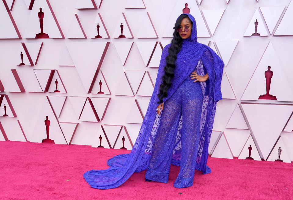 H.E.R attends the 2021 Academy Awards in custom DundasGetty