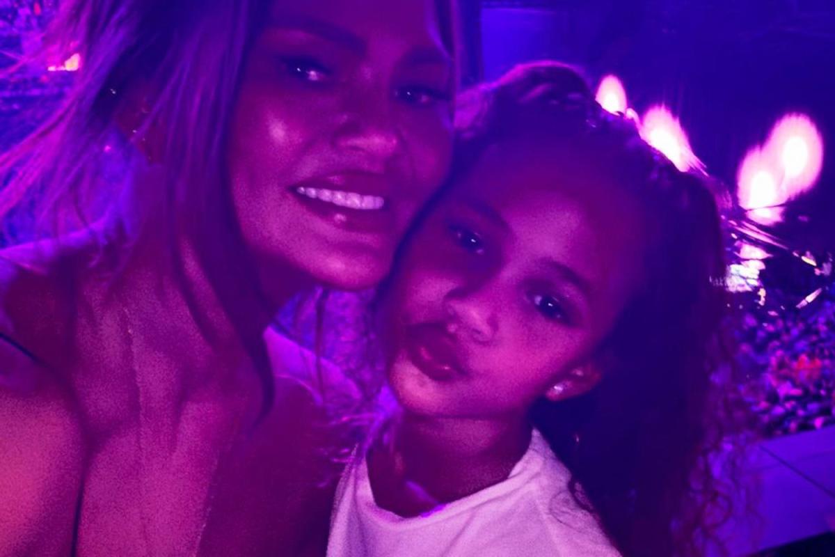 Chrissy Teigen and daughter Luna, 8, dance to Chappell Roan’s “Hot to Go!” at the Olivia Rodrigo concert