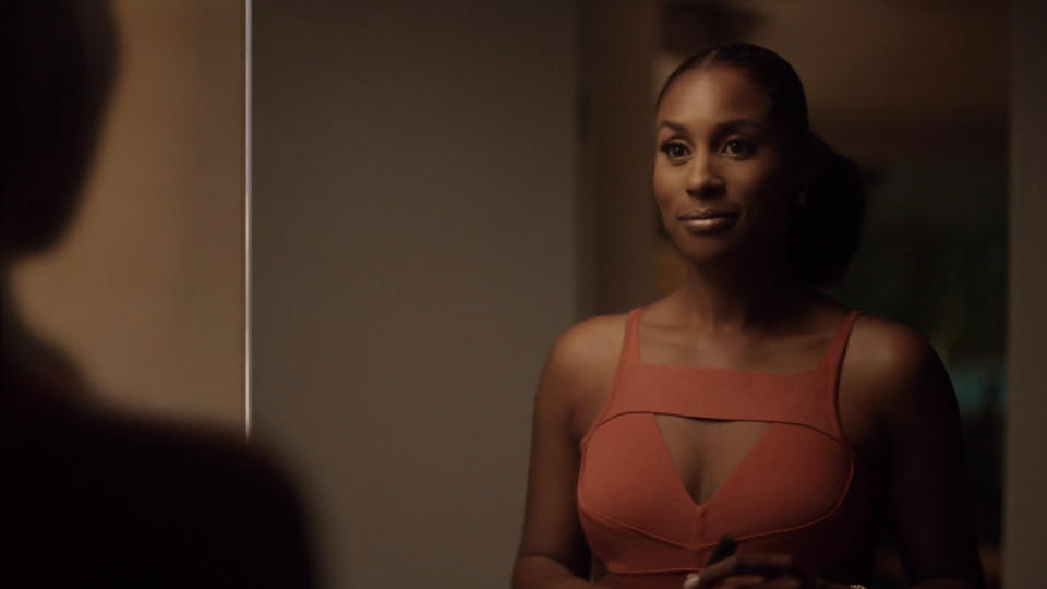 issa rae in "insecure" stares into the mirror