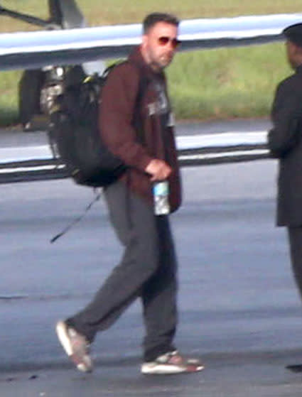 Looks like Ben and Jen are about to see each other once again! Just days after Ben Affleck was spotted alone in Los Angeles, looking somber, the <em>Batman v Superman</em> actor has boarded a private jet at Van Nuys Airport heading for Atlanta, Georgia, ET has learned exclusively. <strong>WATCH: EXCLUSIVE: A Somber Ben Affleck Returns Alone After Bahamas Trip With Jennifer Garner </strong> FameFlynet FameFlynet <strong>NEWS: Ben Affleck Breaks Social Media Silence After Jennifer Garner Split</strong> His soon-to-be ex-wife Jennifer Garner has also been spotted in Atlanta where she is set to begin filming her latest movie, <em>Miracles From Heaven</em>. One bit of good news for Affleck: Garner was still wearing her wedding band despite the couple announcing their divorce June 30. Likewise, Affleck was also still sporting his wedding band during his solo L.A. sighting. Splash News Affleck was spotted on the tarmac after touching down at the DeKalb Peachtree Airport in Chamblee, Georgia. Sources tell ET that Affleck went straight to the private house Garner is staying at while in Atlanta. FameFlynet Affleck will also begin shooting his own project, <em>Live by Night</em>, in Atlanta this month, which may also create several more photo ops with Garner. After this trip to Atlanta, Affleck will fly back to the West Coast for his first public appearance at San Diego's Comic-Con for Saturday's <em>Batman v Superman</em> panel. The couple was most recently together in the Bahamas on July 3, where they were photographed having an intimate conversation. <strong>WATCH: Ben & Jen's Split: New Details on What Went Wrong</strong> "After much thought and careful consideration, we have made the difficult decision to divorce," Affleck, 42, and Garner, 43, said in their statement to ET last week. "We go forward with love and friendship for one another and a commitment to co-parenting our children whose privacy we ask to be respected during this difficult time. This will be our only comment on this private, family matter. Thank you for understanding." The statement came after the couple tried to save their marriage through therapy. Ultimately, they grew apart due to personal and professional differences. The two share three children -- Violet, 9, Sereaphina, 6, and Samuel, 3.