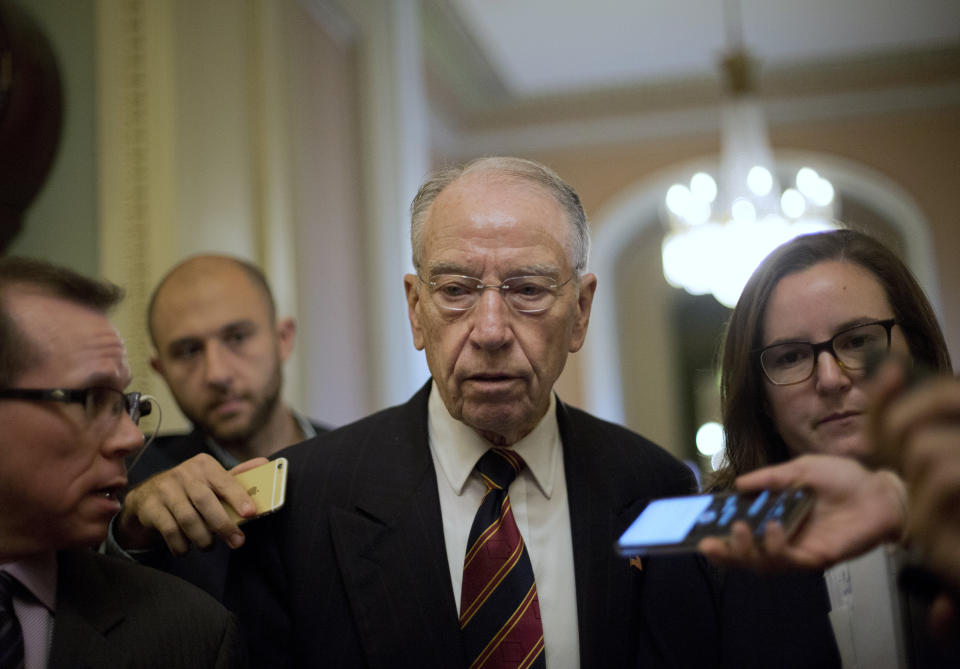 Sen. Chuck Grassley, R-Iowa, walks past members of the media as he heads to the Senate Chamber floor on Capitol Hill in Washington, Tuesday, Sept. 18, 2018. (AP Photo/Pablo Martinez Monsivais)