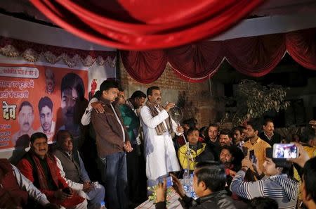 Sanjeev Balyan (C), agriculture minister and a member of ruling Bharatiya Janata Party (BJP), addresses a by-election campaign rally in Muzaffarnagar district in Uttar Pradesh, February 9, 2016. REUTERS/Anindito Mukherjee