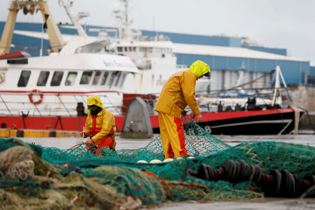 Net loss: French fishermen at Boulogne-sur-Mer, northern France  (Reuters)