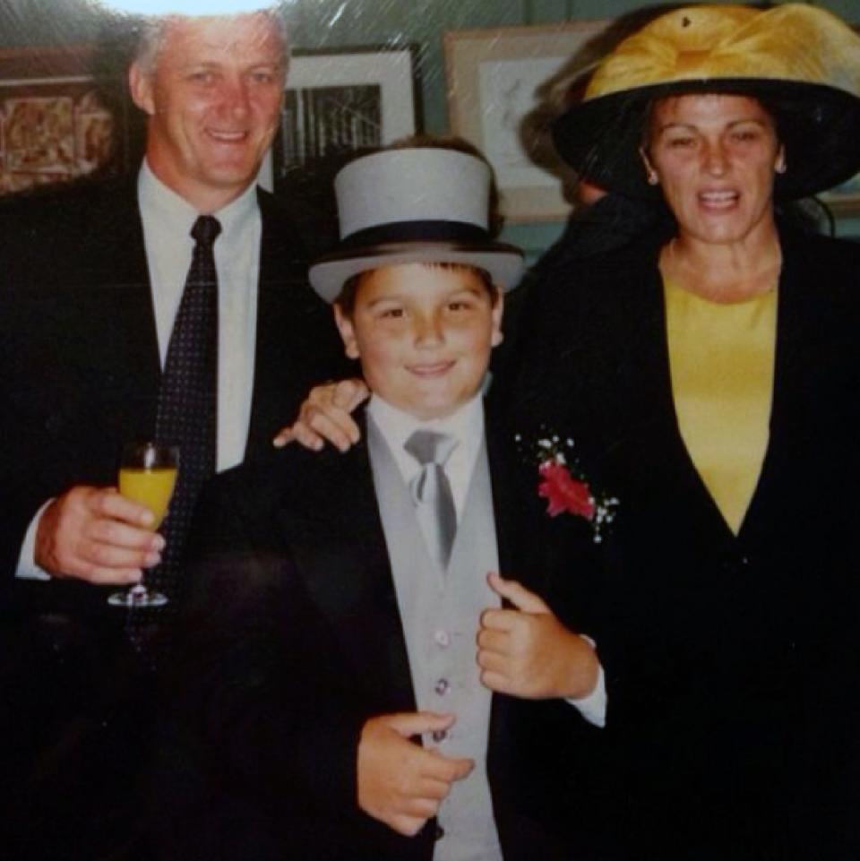 Jamie George as a boy with his father and mother