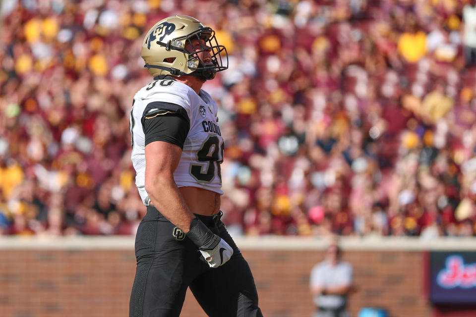 Sep 17, 2022; Minneapolis, Minnesota, USA; Colorado Buffaloes defensive end Chance Main (90) reacts after making a tackle against the Minnesota Golden Gophers during the second quarter at Huntington Bank Stadium. Mandatory Credit: Matt Krohn-USA TODAY Sports