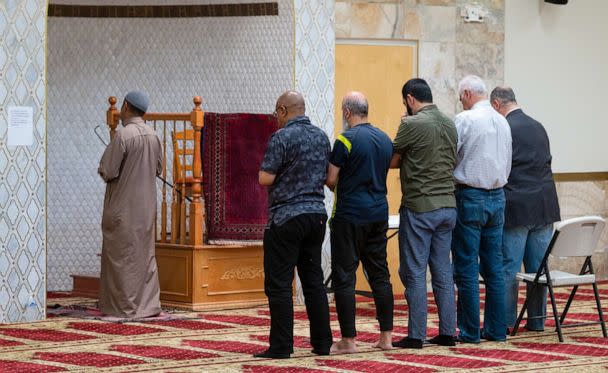 PHOTO: An Imam leads a group of men during the Dhuhr afternoon prayer at the Islamic Center of New Mexico on Aug. 7, 2022, after the fourth Muslim man was murdered in Albuquerque. (Adolphe Pierre-Louis/Albuquerque Journal via ZUMA Press Wire)