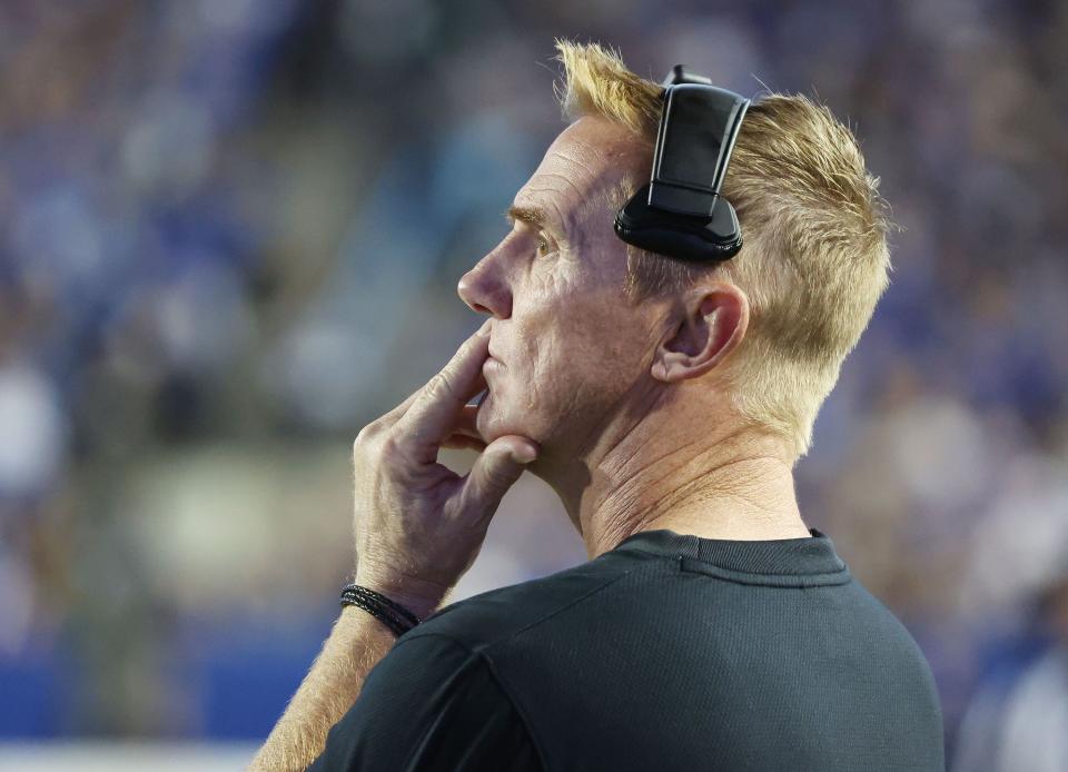 Utah State Aggies football head coach Blake Anderson watches the BYU game in Provo on Sept. 29, 2022.