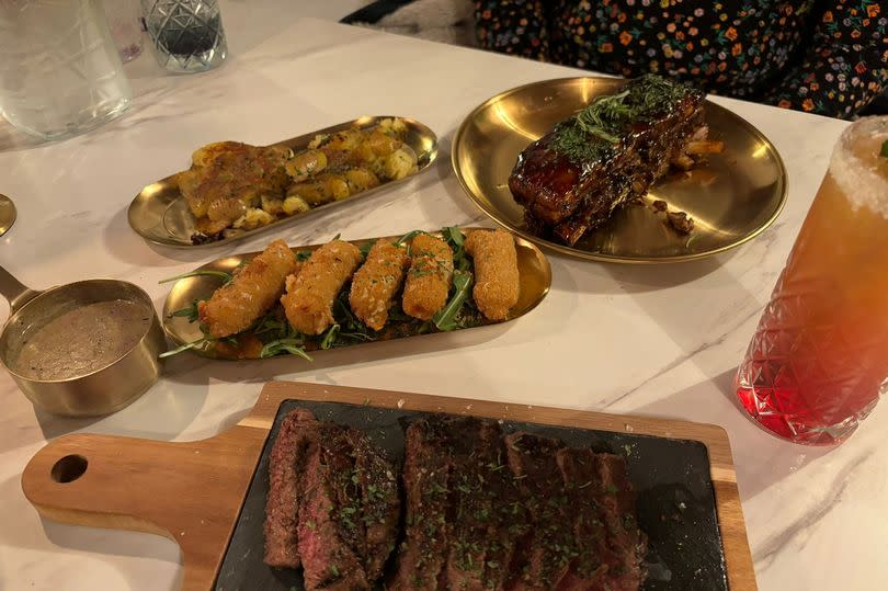 I was blown away by my dinner! Pictured: steak (medium), mac & cheese bites, crushed salt and pepper potatoes, Ribs Korean style - and a mocktail!