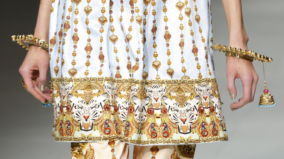 A model wears a creation for Indian fashion designer Manish Arora's ready to wear Spring-Summer 2013 collection, presented in Paris, Thursday, Sept.27, 2012. (AP Photo/Jacques Brinon)