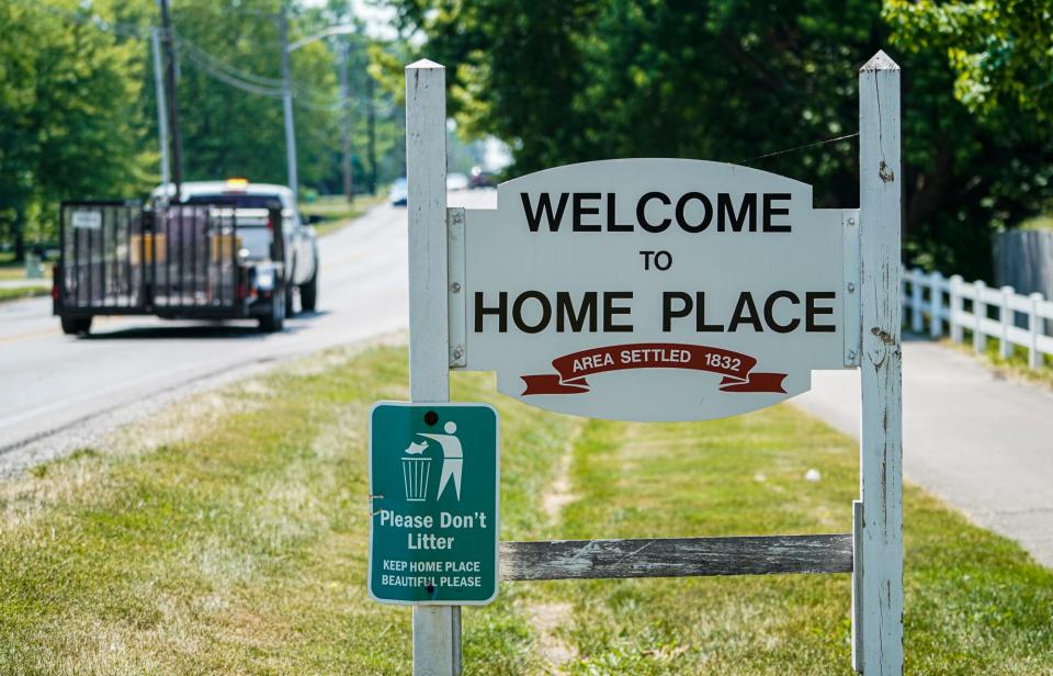 A sign welcomes visitors at 106th St. and the Monon Trail in the Home Place neighborhood of Carmel Ind., on Thursday, June 8, 2023. 
