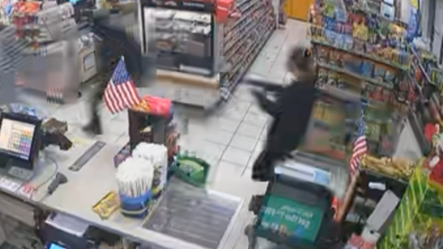 Surveillance video shows a robbery at a 7-Eleven in the Canoga Park area.