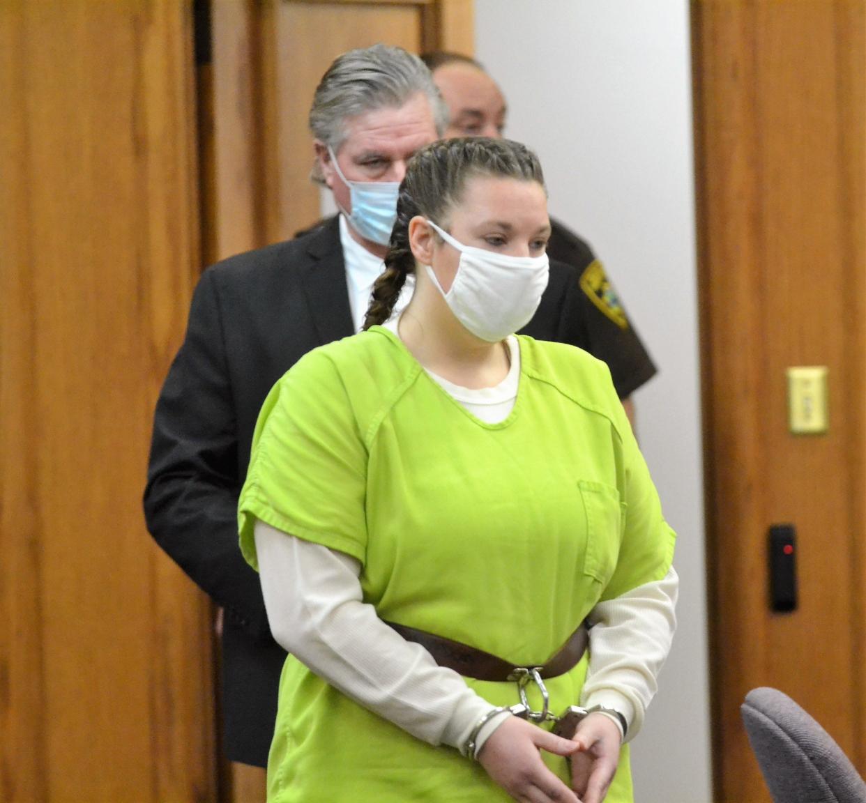 Alisha Kocken, 34, of Oconto Falls, enters Oconto County Circuit Court on Friday, Jan. 7, 2022, for her preliminary hearing on charges related to shooting of Oconto Falls Police officer Nicole Blaskowski on Aug. 6, 2021. Behind her is her attorney, John Miller Carroll.