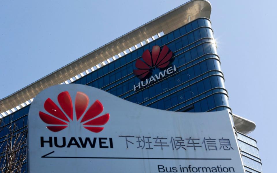 UK telecoms providers such as Three are working with Huawei to implement the Chinese firm's equipment into their 5G infrastructure - AP