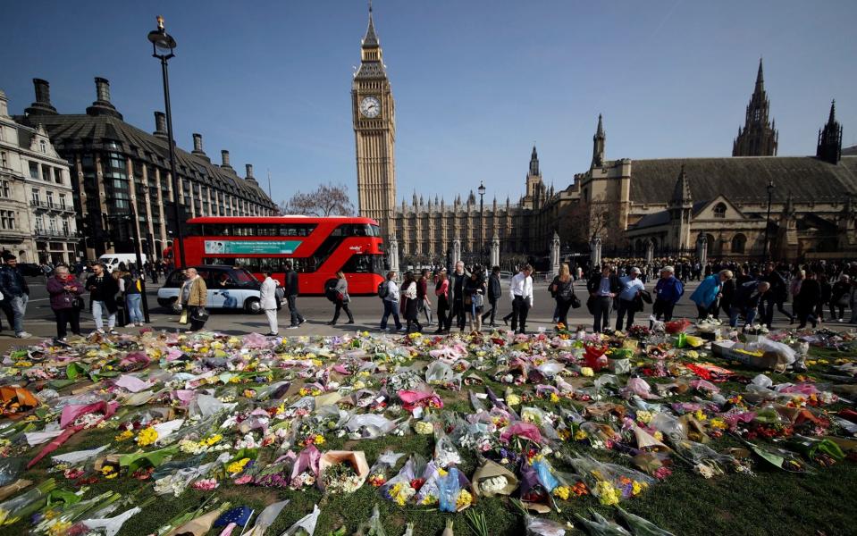 Floral tributes to the victims of the Westminster attack - Credit: Matt Dunham/AP