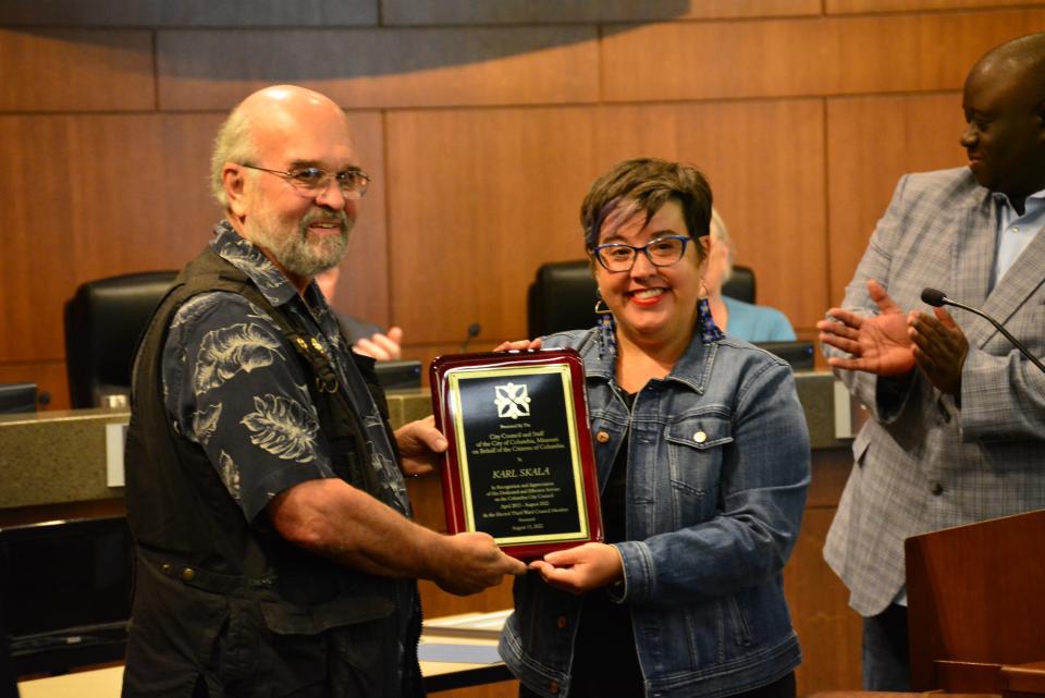 Columbia Mayor Barbara Buffaloe presents a commemorative plaque Saturday to outgoing Third Ward council member Karl Skala for his dedicated years of service to the city.