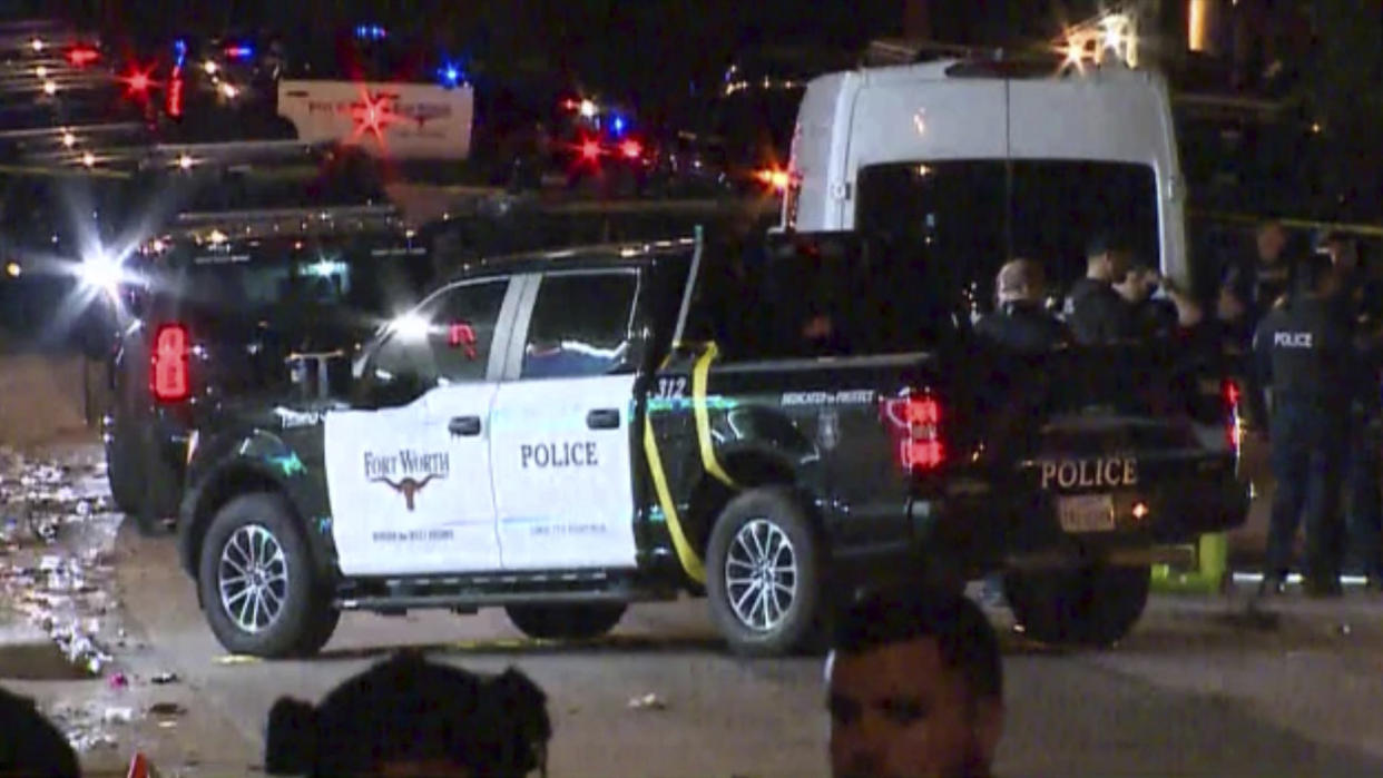 Officers respond to a deadly shooting in Fort Worth, Texas, late Monday. (WFAA via AP)