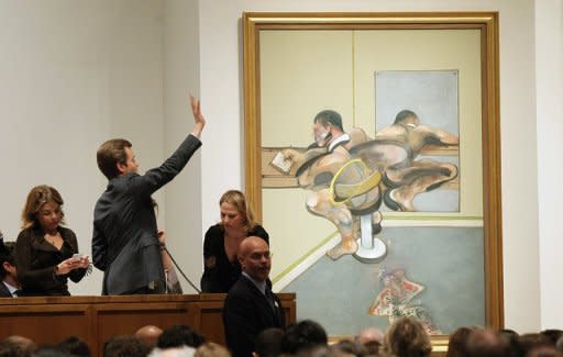 Francis Bacon's "Figure Writing Reflected in a Mirror" is auctioned off at Sotheby's in New York on May 9. The painting brought in $44.9 million at Sotheby's, capping a week of breathtaking sales in the luxury art market