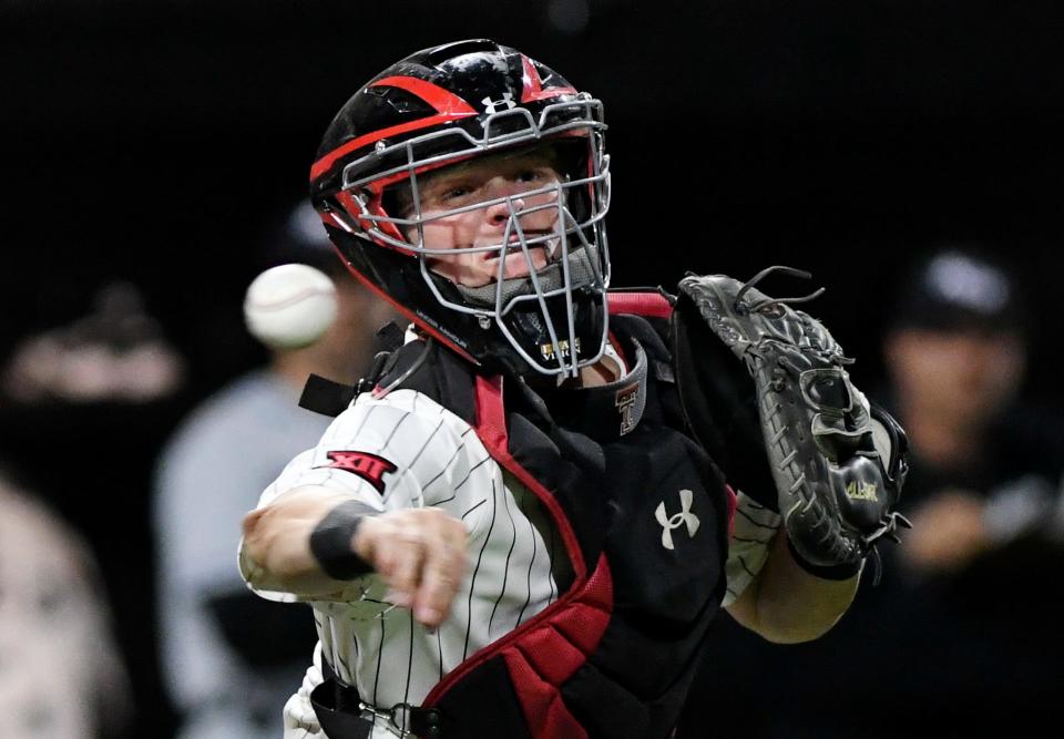 Texas Tech's Hudson White (5) throws to first base at the game against the Abilene Christian, Tuesday, April 26, 2022, on Dan Law Field at Rip Griffin Park. 