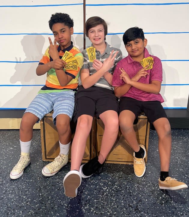 Marlo Reed, left, Jack Carslake, and Arnav Mali in “Diary of a Wimpy Kid: The Musical.”