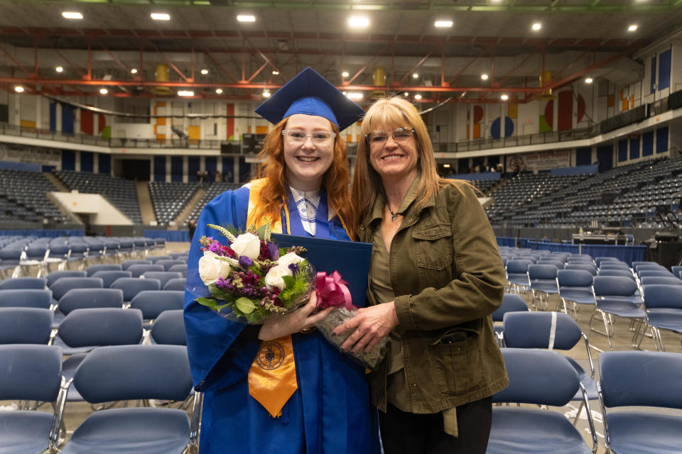 Commencement speaker Rylee Moore and her mom Ginger Lynn Akin share a moment Friday evening at the Amarillo College Commencement Ceremony at the Amarillo Civic Center.