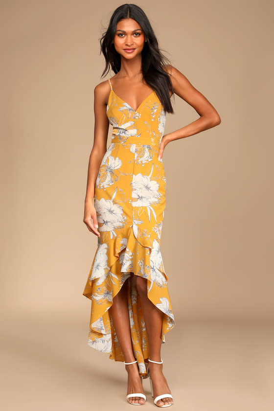 woman wears Darling Daylily Mustard Yellow Floral Print High-Low Maxi Dress